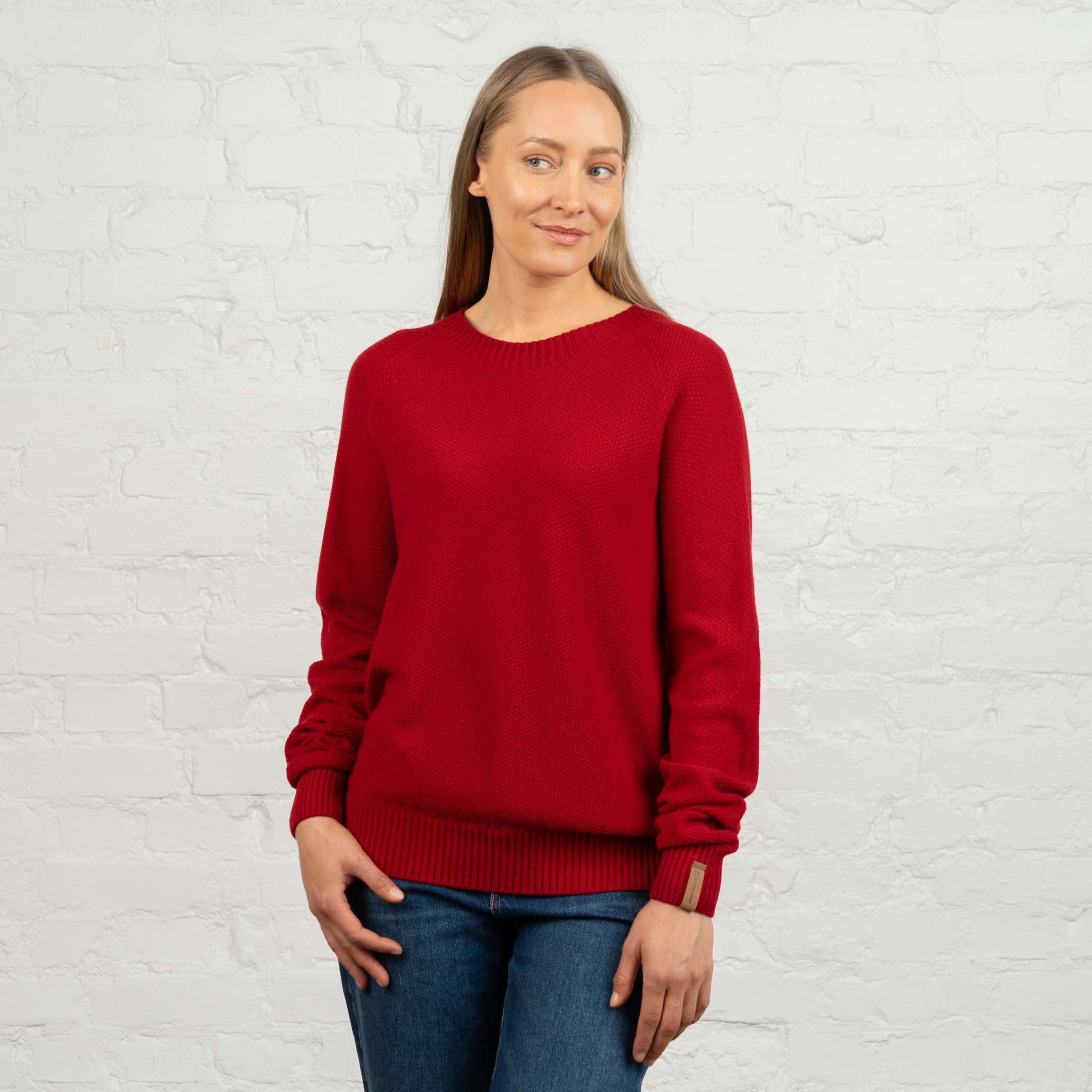 The model is 174 cm and wears size M.