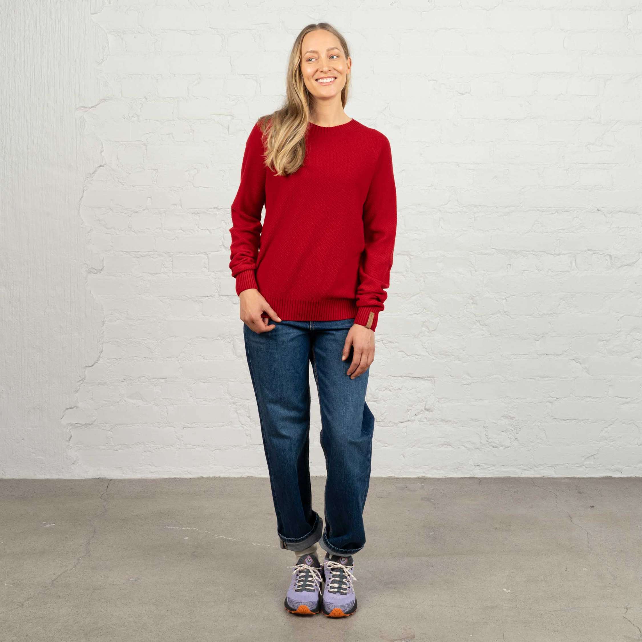 The model is 174 cm and wears size M.