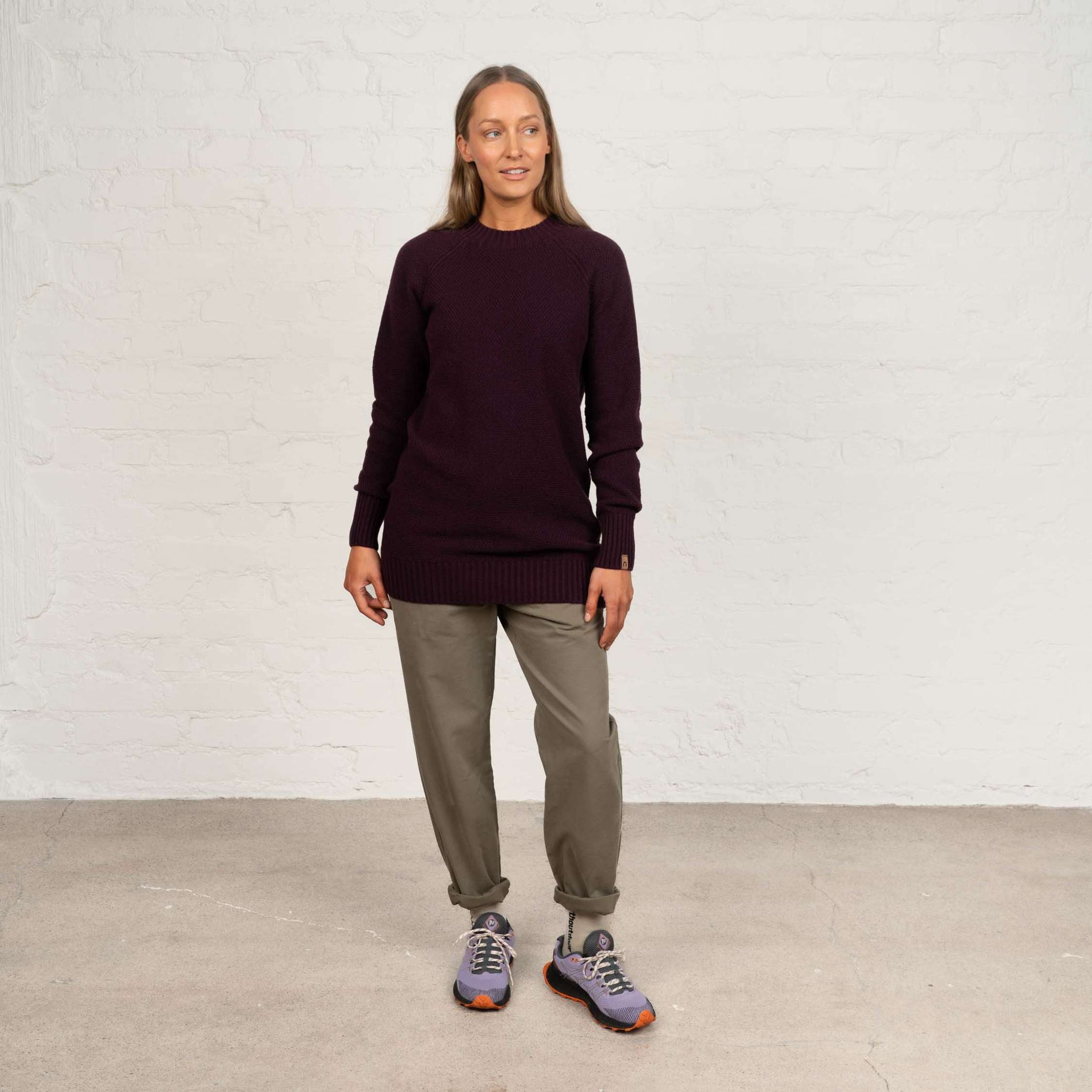 The model is 174 cm and wears size M.