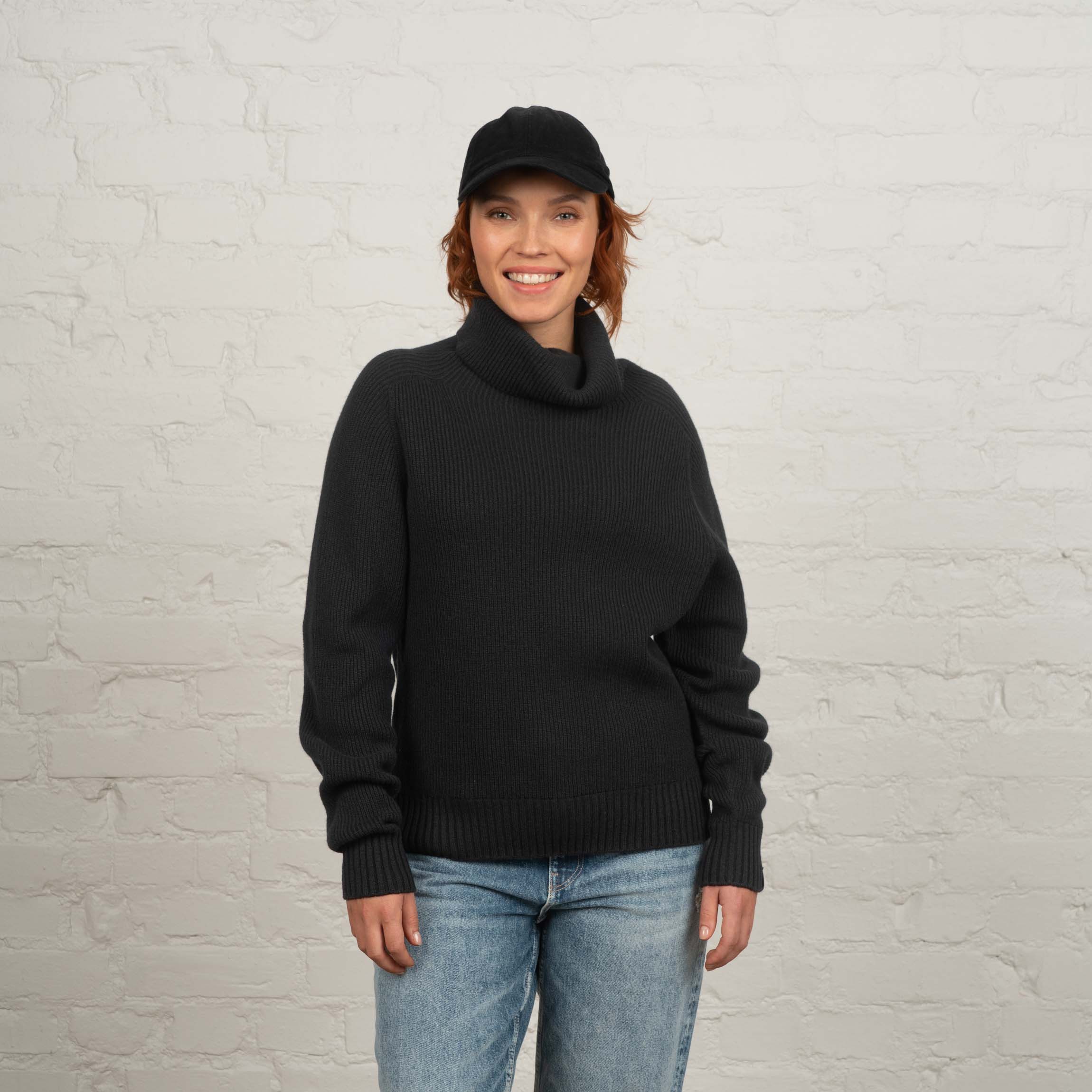 The model is 173 cm and wears size M.