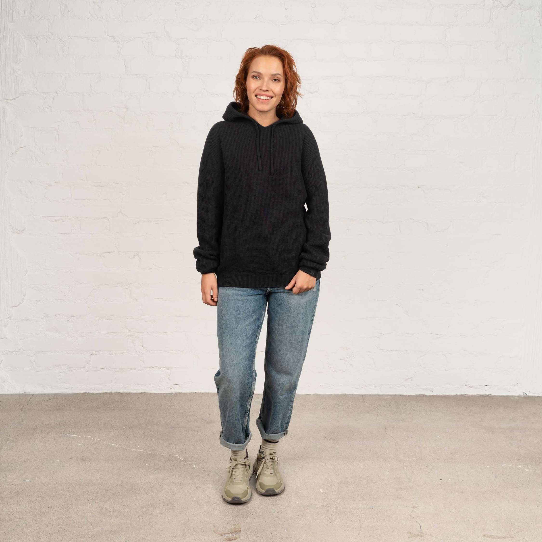 The model is 173 cm and wears size M.