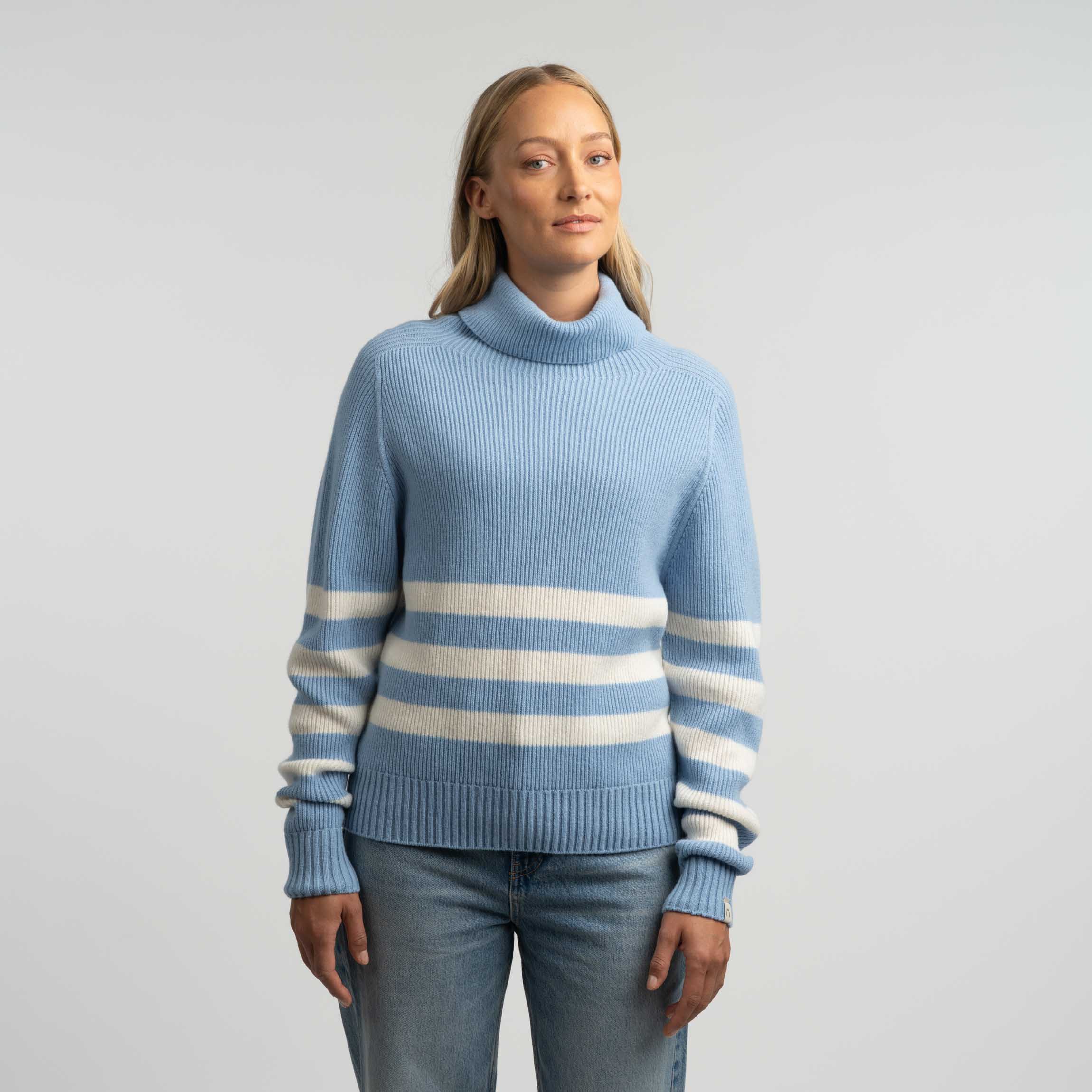 The model is 174 cm and wears size M.