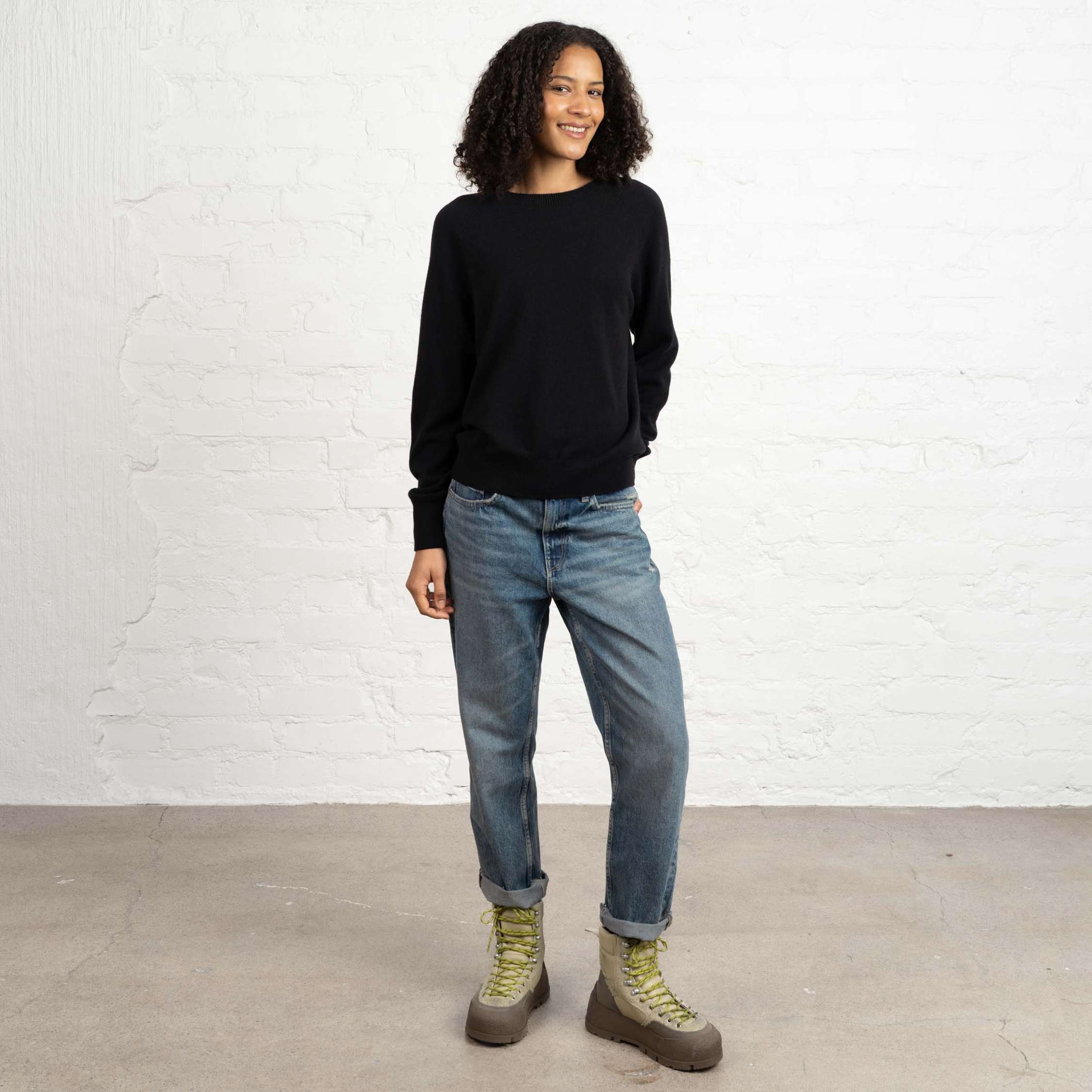 The model is 180 cm and wears size M.