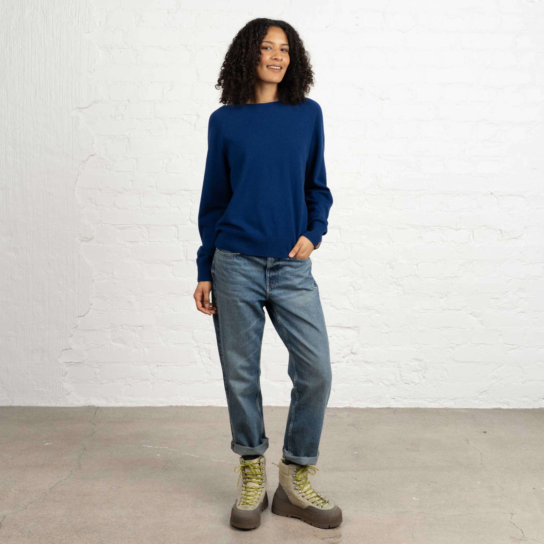 The model is 180 cm and wears size M.